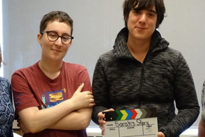 Dr. Marian Luctkar-Flude filming a virtual simulation game with a group  of students
